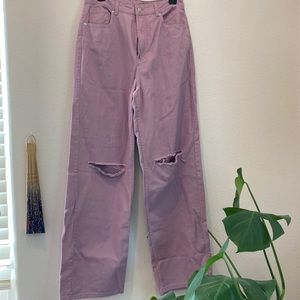 Distressed purple jeans